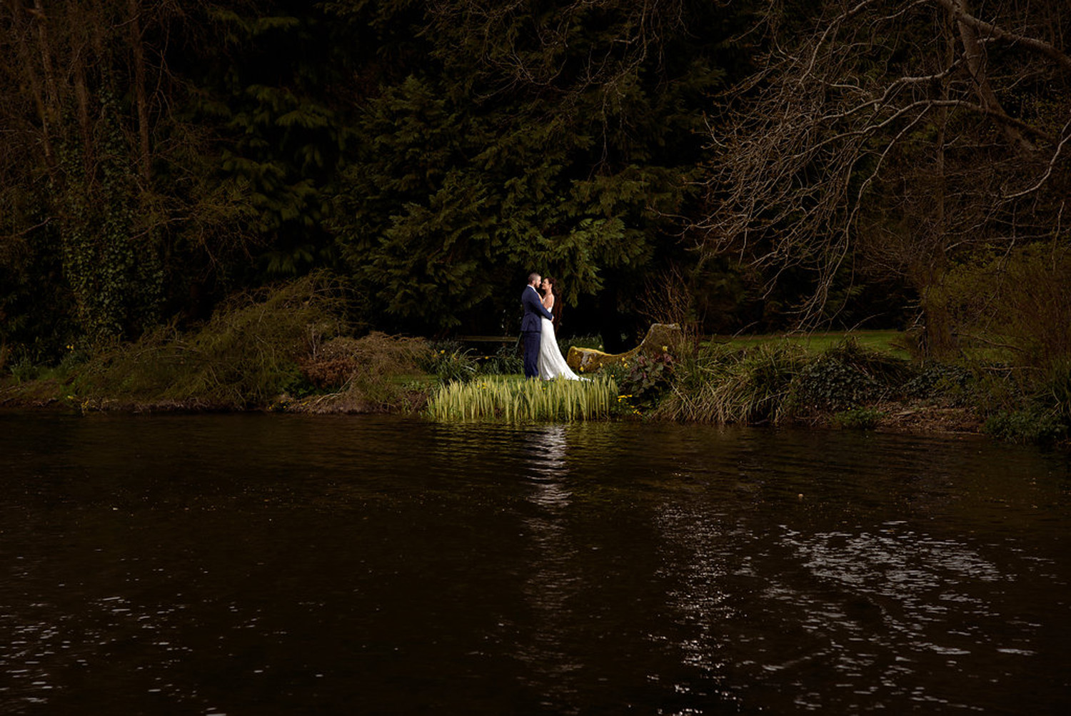 manor house elopement couple just married by the lake 