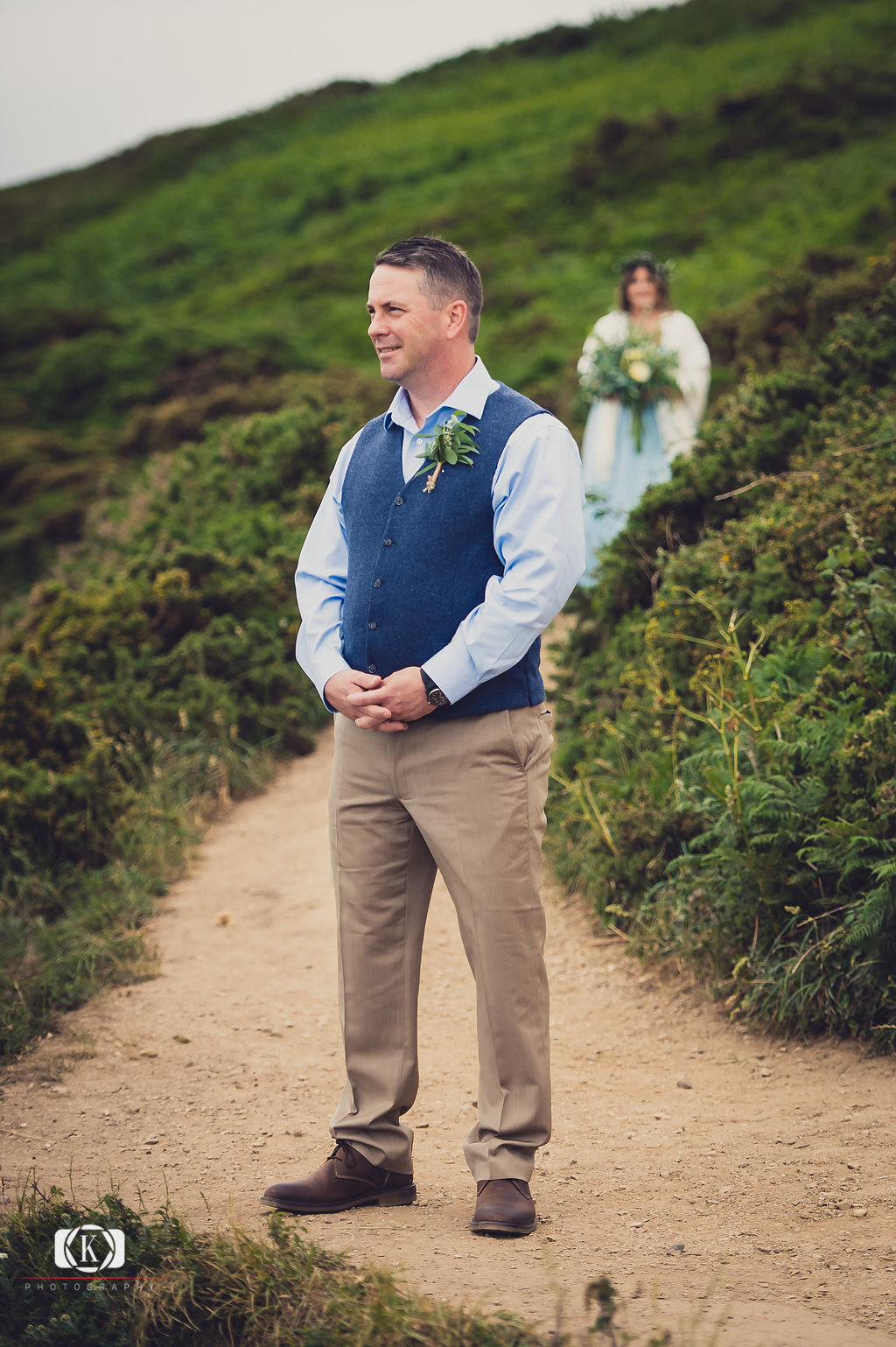 Elopement Ceremony in Dublin Cliff in Ireland Elope to Ireland elopement in dublin on Howth lighthouse walk cliff groom waiting for bride first look