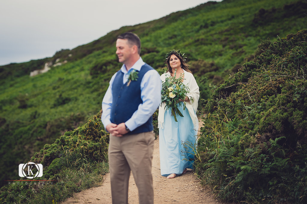 Elope to Ireland elopement in dublin on Howth lighthouse walk cliff groom waiting for bride first look