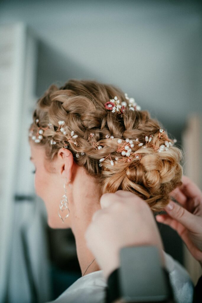 bride having her hair fixed