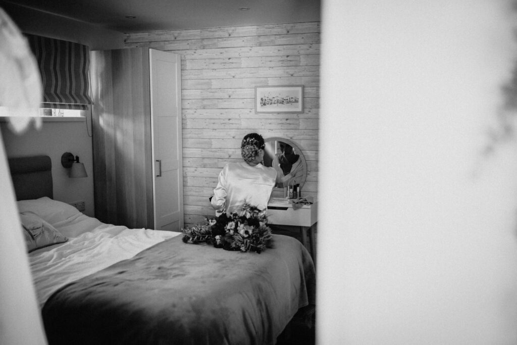 grrom pondering before the big day in black and white