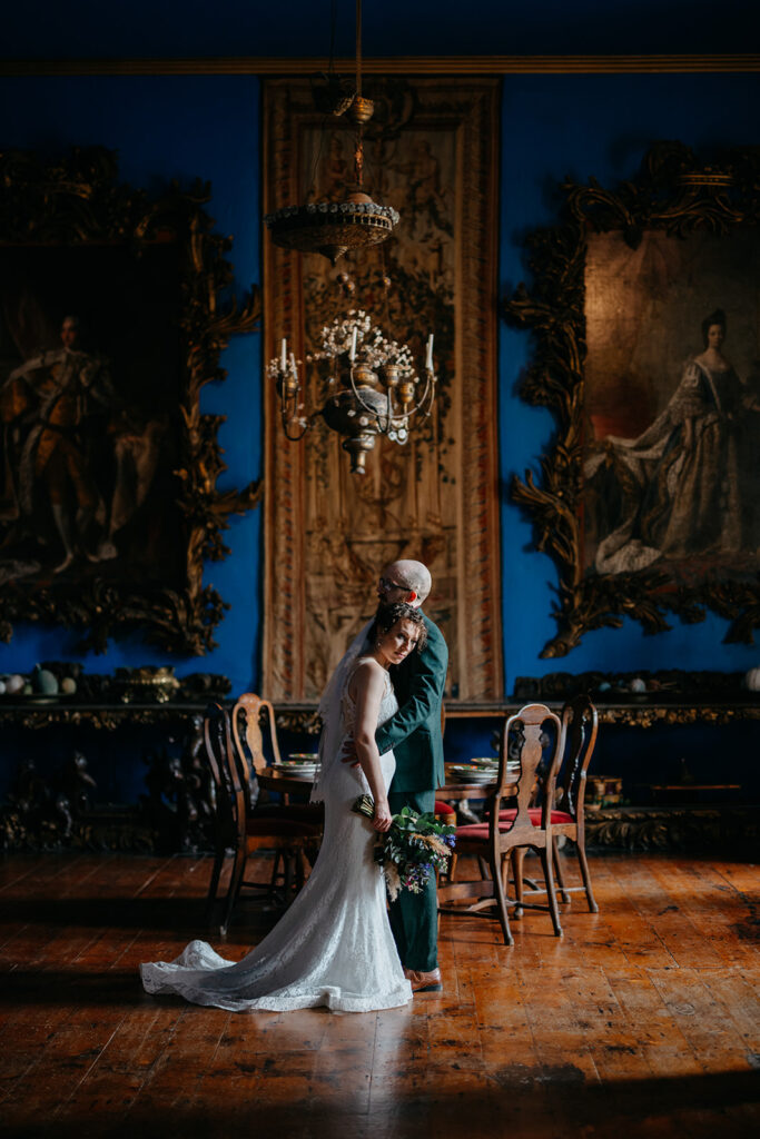 Ireland: The Perfect Elopement for a New Brunswick Couple standing close to gether in a majestic room in at 