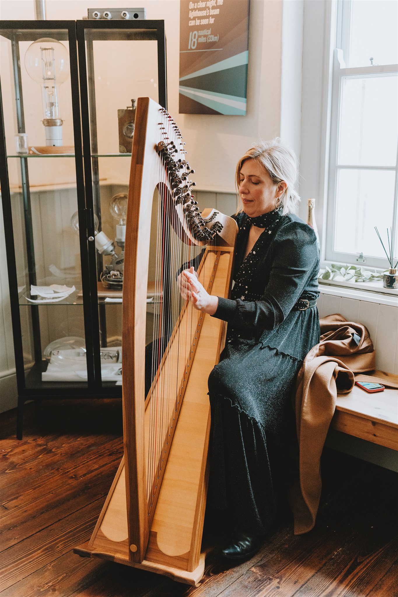 a harp player at the ceremony