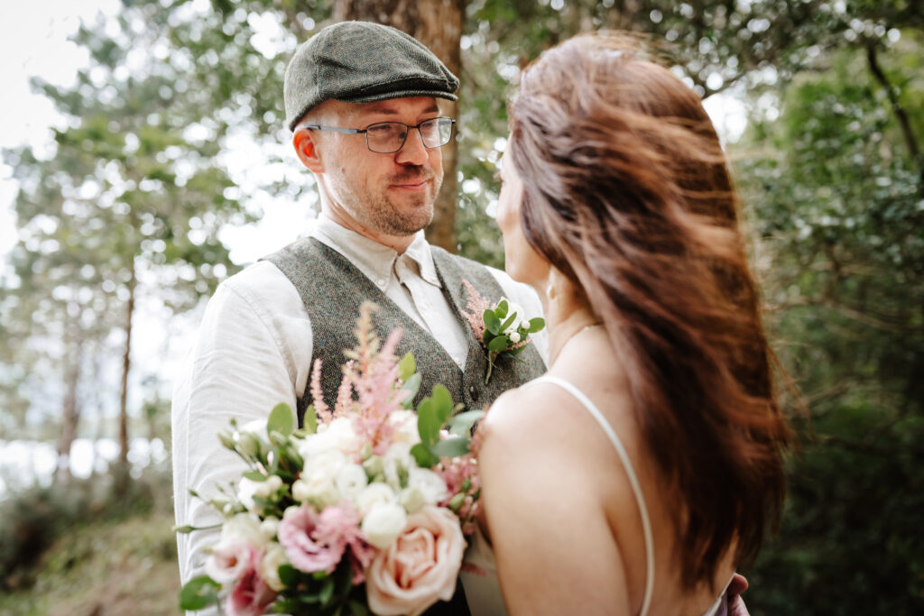 a close shot of the brid and groom together after the first look